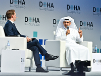 Qatar's Energy Minister and CEO of QatarEnergy, Saad Sherida al-Kaabi (R), speaks during the Doha Forum 2024 at Sheraton Grand Doha Resort &...