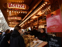 People are at the Christmas market on Place Carnot in Lyon, France, on December 7, 2024. (