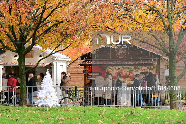 People are at the Christmas market on Place Carnot in Lyon, France, on December 7, 2024. 