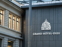 Several people attend the creators market at the Grand Hotel Dieu in Lyon, France, on December 7, 2024. (