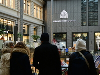 Several people attend the creators market at the Grand Hotel Dieu in Lyon, France, on December 7, 2024. (