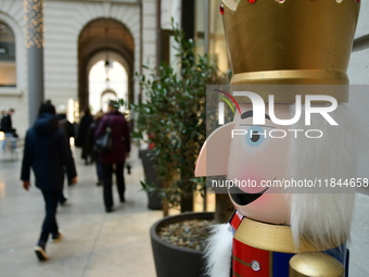 Several people attend the creators market at the Grand Hotel Dieu in Lyon, France, on December 7, 2024. (