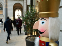 Several people attend the creators market at the Grand Hotel Dieu in Lyon, France, on December 7, 2024. (