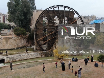 Celebrations continue in the city of Hama, where Syrians gather at Al-Assi Square to take commemorative photos and express their joy over th...