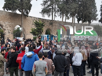 Celebrations continue in the city of Hama, where Syrians gather at Al-Assi Square to take commemorative photos and express their joy over th...