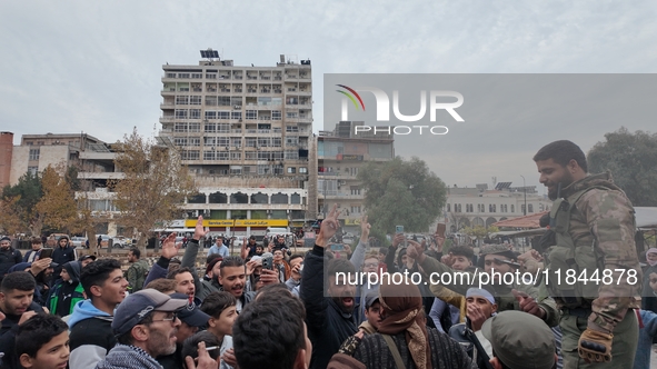 Celebrations continue in the city of Hama, where Syrians gather at Al-Assi Square to take commemorative photos and express their joy over th...