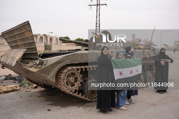 Celebrations continue in the city of Hama, where Syrians gather at Al-Assi Square to take commemorative photos and express their joy over th...