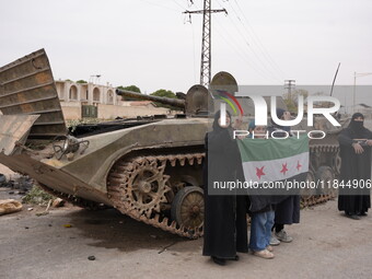 Celebrations continue in the city of Hama, where Syrians gather at Al-Assi Square to take commemorative photos and express their joy over th...