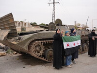 Celebrations continue in the city of Hama, where Syrians gather at Al-Assi Square to take commemorative photos and express their joy over th...