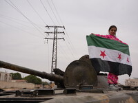 Celebrations continue in the city of Hama, where Syrians gather at Al-Assi Square to take commemorative photos and express their joy over th...