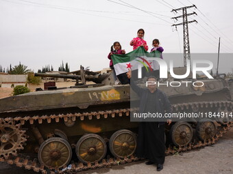 Celebrations continue in the city of Hama, where Syrians gather at Al-Assi Square to take commemorative photos and express their joy over th...