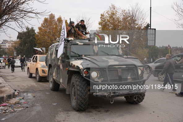 Celebrations continue in the city of Hama, where Syrians gather at Al-Assi Square to take commemorative photos and express their joy over th...