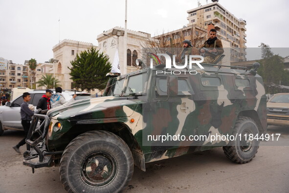 Celebrations continue in the city of Hama, where Syrians gather at Al-Assi Square to take commemorative photos and express their joy over th...