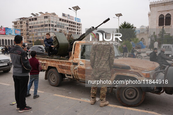 Celebrations continue in the city of Hama, where Syrians gather at Al-Assi Square to take commemorative photos and express their joy over th...