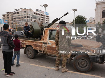 Celebrations continue in the city of Hama, where Syrians gather at Al-Assi Square to take commemorative photos and express their joy over th...