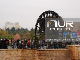 Celebrations continue in the city of Hama, where Syrians gather at Al-Assi Square to take commemorative photos and express their joy over th...