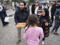 Celebrations continue in the city of Hama, where Syrians gather at Al-Assi Square to take commemorative photos and express their joy over th...