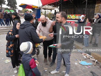 Celebrations continue in the city of Hama, where Syrians gather at Al-Assi Square to take commemorative photos and express their joy over th...