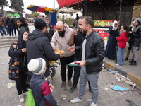 Celebrations continue in the city of Hama, where Syrians gather at Al-Assi Square to take commemorative photos and express their joy over th...