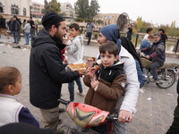 Celebrations continue in the city of Hama, where Syrians gather at Al-Assi Square to take commemorative photos and express their joy over th...