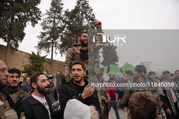 Celebrations continue in the city of Hama, where Syrians gather at Al-Assi Square to take commemorative photos and express their joy over th...