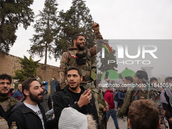 Celebrations continue in the city of Hama, where Syrians gather at Al-Assi Square to take commemorative photos and express their joy over th...