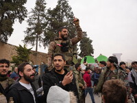 Celebrations continue in the city of Hama, where Syrians gather at Al-Assi Square to take commemorative photos and express their joy over th...