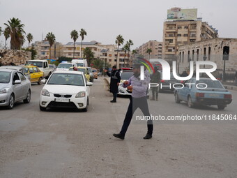 Celebrations continue in the city of Hama, where Syrians gather at Al-Assi Square to take commemorative photos and express their joy over th...