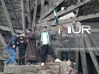 Celebrations continue in the city of Hama, where Syrians gather at Al-Assi Square to take commemorative photos and express their joy over th...