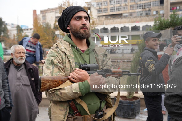 Celebrations continue in the city of Hama, where Syrians gather at Al-Assi Square to take commemorative photos and express their joy over th...