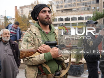 Celebrations continue in the city of Hama, where Syrians gather at Al-Assi Square to take commemorative photos and express their joy over th...