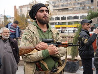 Celebrations continue in the city of Hama, where Syrians gather at Al-Assi Square to take commemorative photos and express their joy over th...