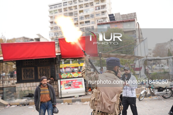 Celebrations continue in the city of Hama, where Syrians gather at Al-Assi Square to take commemorative photos and express their joy over th...