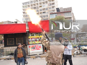 Celebrations continue in the city of Hama, where Syrians gather at Al-Assi Square to take commemorative photos and express their joy over th...