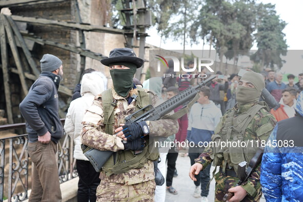 Celebrations continue in the city of Hama, where Syrians gather at Al-Assi Square to take commemorative photos and express their joy over th...