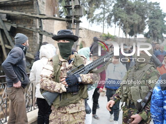 Celebrations continue in the city of Hama, where Syrians gather at Al-Assi Square to take commemorative photos and express their joy over th...