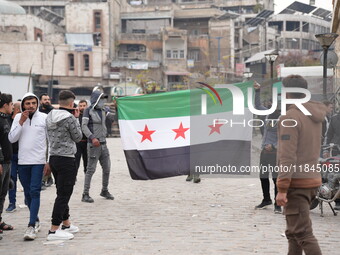 Celebrations continue in the city of Hama, where Syrians gather at Al-Assi Square to take commemorative photos and express their joy over th...