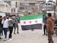 Celebrations continue in the city of Hama, where Syrians gather at Al-Assi Square to take commemorative photos and express their joy over th...