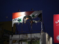 Celebrations continue in the city of Hama, where Syrians gather at Al-Assi Square to take commemorative photos and express their joy over th...