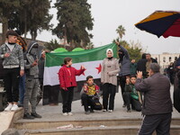 Celebrations continue in the city of Hama, where Syrians gather at Al-Assi Square to take commemorative photos and express their joy over th...