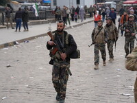 Celebrations continue in the city of Hama, where Syrians gather at Al-Assi Square to take commemorative photos and express their joy over th...