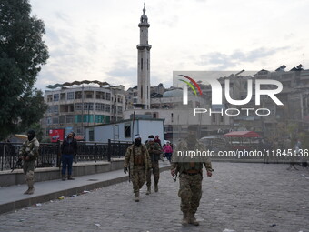 Celebrations continue in the city of Hama, where Syrians gather at Al-Assi Square to take commemorative photos and express their joy over th...