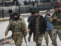 Celebrations continue in the city of Hama, where Syrians gather at Al-Assi Square to take commemorative photos and express their joy over th...