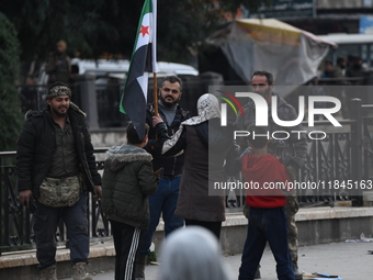 Celebrations continue in the city of Hama, where Syrians gather at Al-Assi Square to take commemorative photos and express their joy over th...