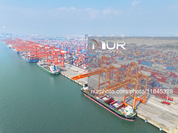 Container cargoes from Qinzhou Automated Container Terminal of Beiwan Port are sold overseas by rail-sea intermodal train on the Western Lan...