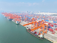 Container cargoes from Qinzhou Automated Container Terminal of Beiwan Port are sold overseas by rail-sea intermodal train on the Western Lan...