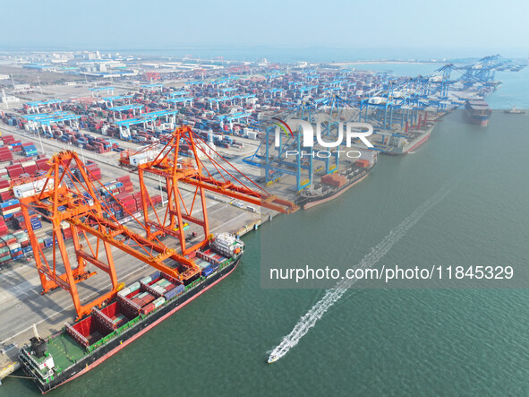 Container cargoes from Qinzhou Automated Container Terminal of Beiwan Port are sold overseas by rail-sea intermodal train on the Western Lan...