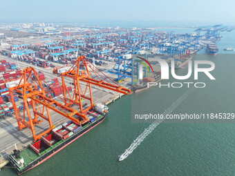 Container cargoes from Qinzhou Automated Container Terminal of Beiwan Port are sold overseas by rail-sea intermodal train on the Western Lan...