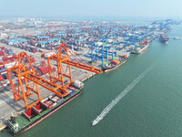 Container cargoes from Qinzhou Automated Container Terminal of Beiwan Port are sold overseas by rail-sea intermodal train on the Western Lan...