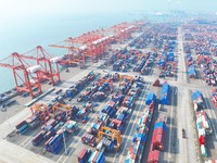 Container cargoes from Qinzhou Automated Container Terminal of Beiwan Port are sold overseas by rail-sea intermodal train on the Western Lan...